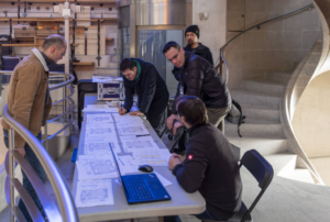 Image showing the team at a desk planning acoustic measurements