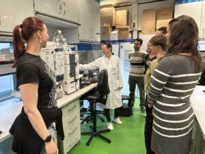 Clavel Lab tour; UKA postdoctoral researcher shows attendees around the laboratory
