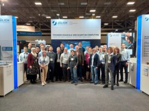 Group photo at the booth of the Jülich Supercomputing Centre (JSC)