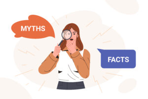 Animated woman woman looking through a magnifying glass comparing myths with facts. 