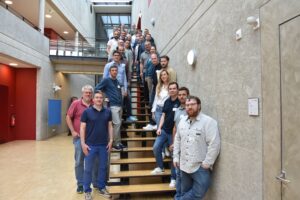 Group picture of participants on stairs