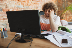 Frustrated man at his desk