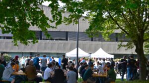 Trainees at outdoor barbecue