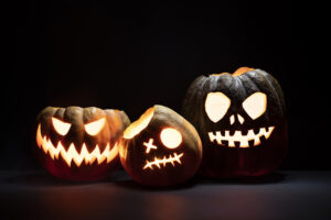 Three carved halloween pumpkins