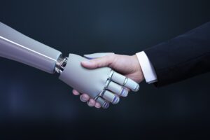 Robot and human being shaking hands